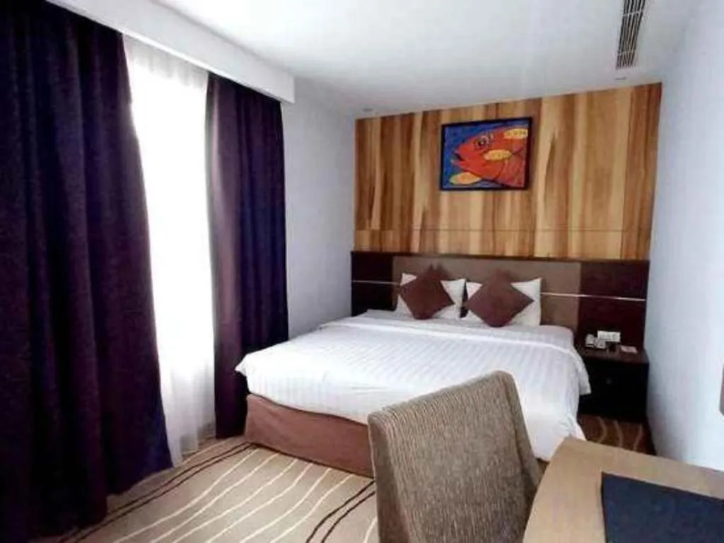 Bed in D Maleo Hotel Makassar