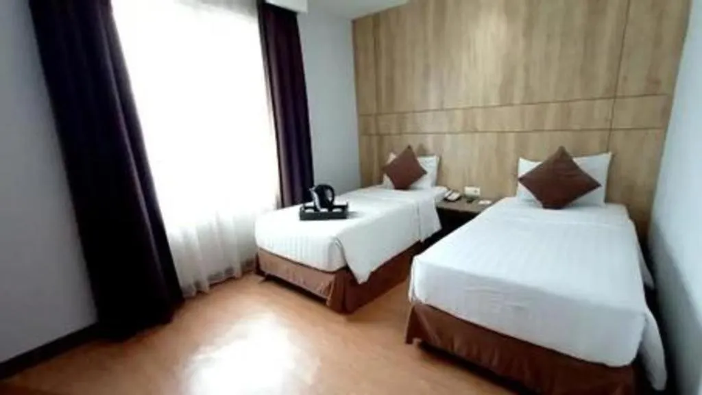 Bed in D Maleo Hotel Makassar