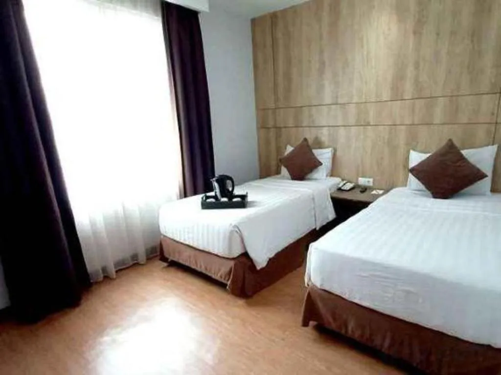 Bed in D Maleo Hotel Makassar