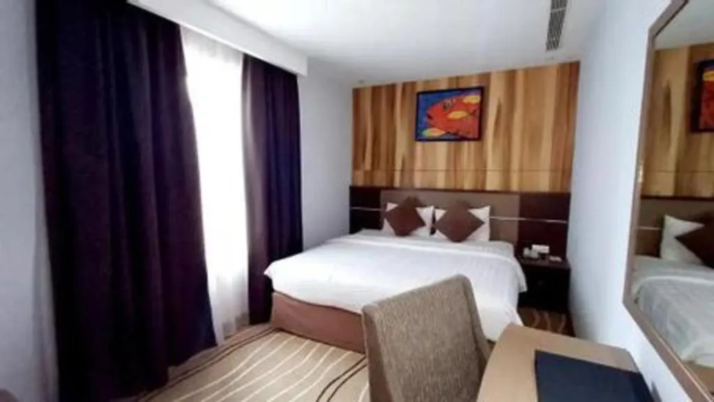 Bed in D Maleo Hotel Makassar