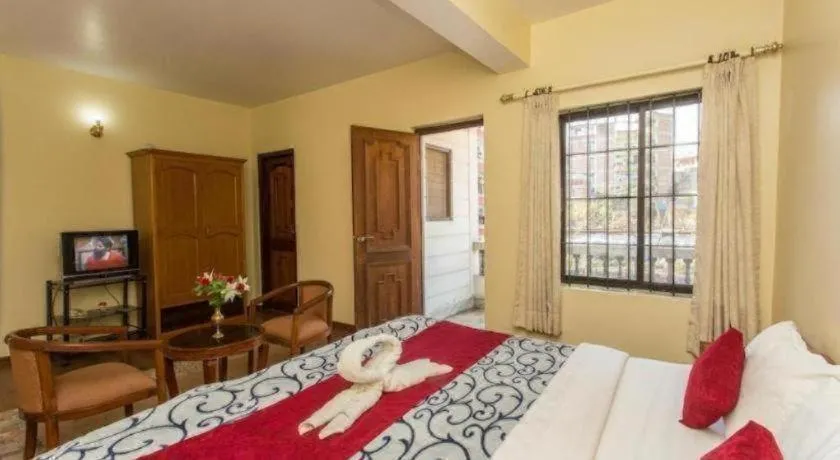 Bed in Hotel Norbu Sangpo