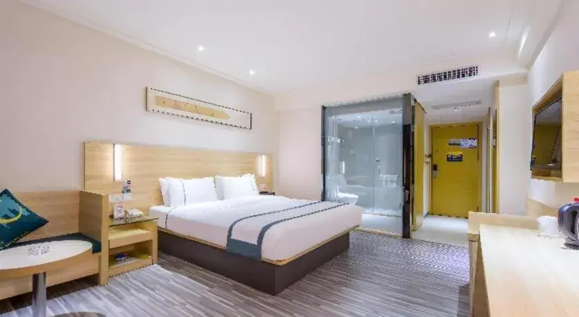 Bed in City Comfort Inn Guangzhou Baiyun Mountain Bed in City Comfort Inn Guangzhou Baiyun Mountain