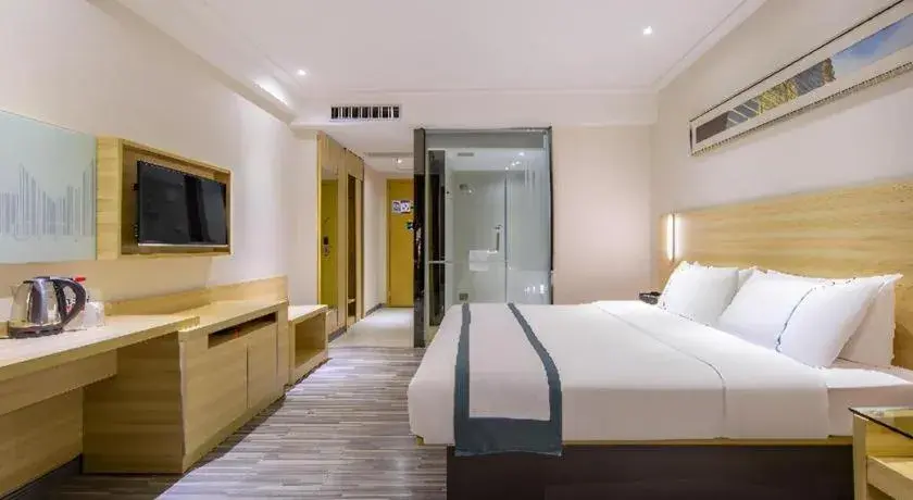 Bed in City Comfort Inn Guangzhou Baiyun Mountain Bed in City Comfort Inn Guangzhou Baiyun Mountain