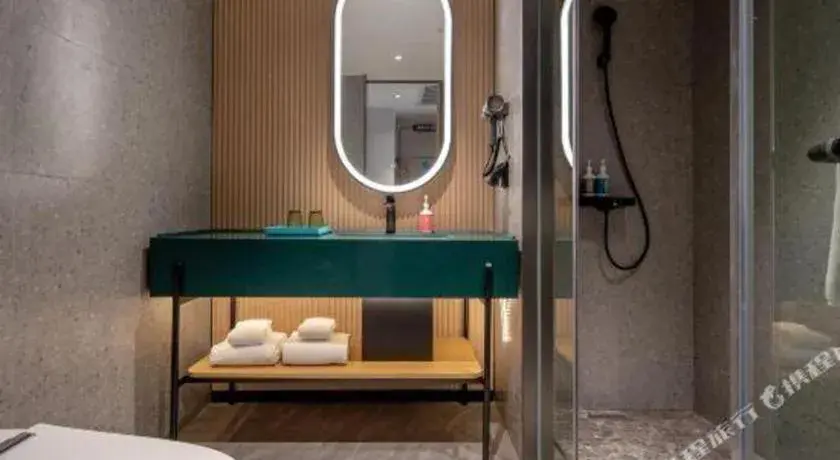 Bed in City Comfort Inn Guangzhou Baiyun Mountain Bed in City Comfort Inn Guangzhou Baiyun Mountain