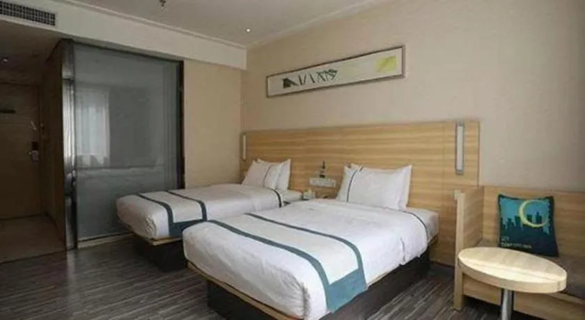 Bed in City Comfort Inn Guangzhou Baiyun Mountain