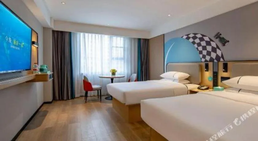 Bed in City Comfort Inn Guangzhou Baiyun Mountain