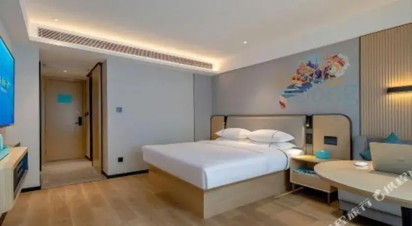 Bed in City Comfort Inn Guangzhou Baiyun Mountain Bed in City Comfort Inn Guangzhou Baiyun Mountain