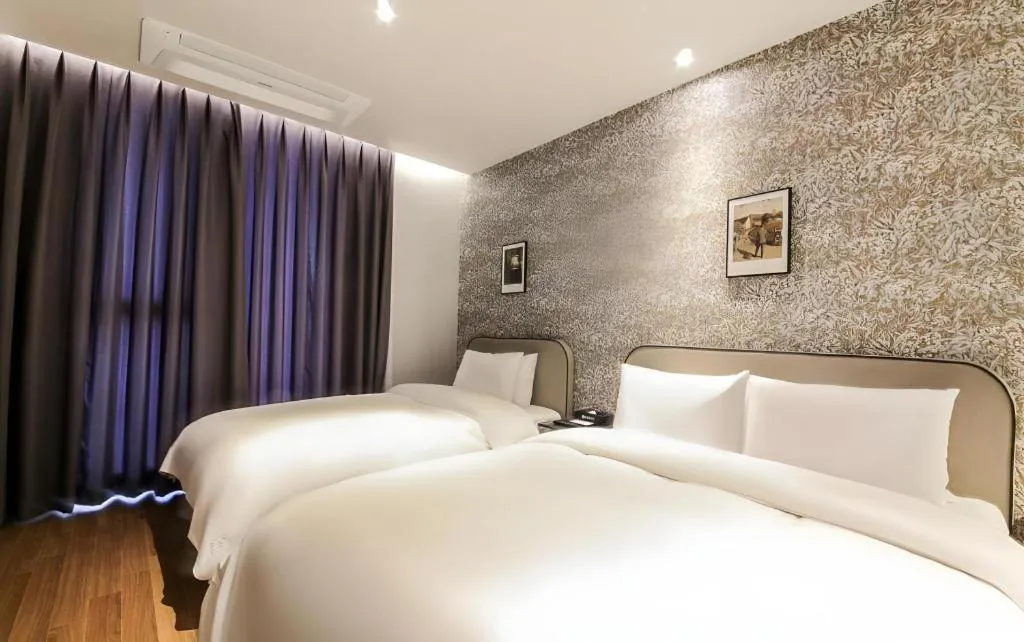 Bed in Gimhae Perfect Hotel