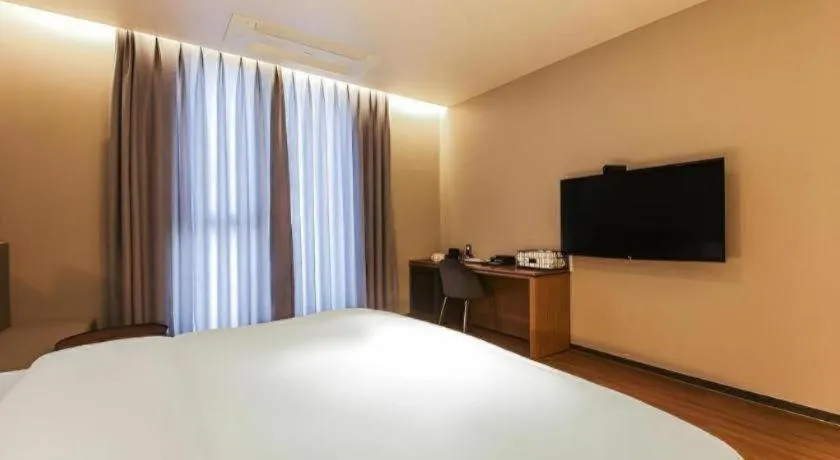 Bed in Gimhae Perfect Hotel