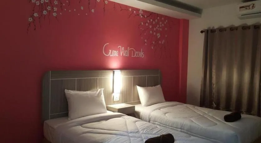 Bed in Silayok Grand Hotel