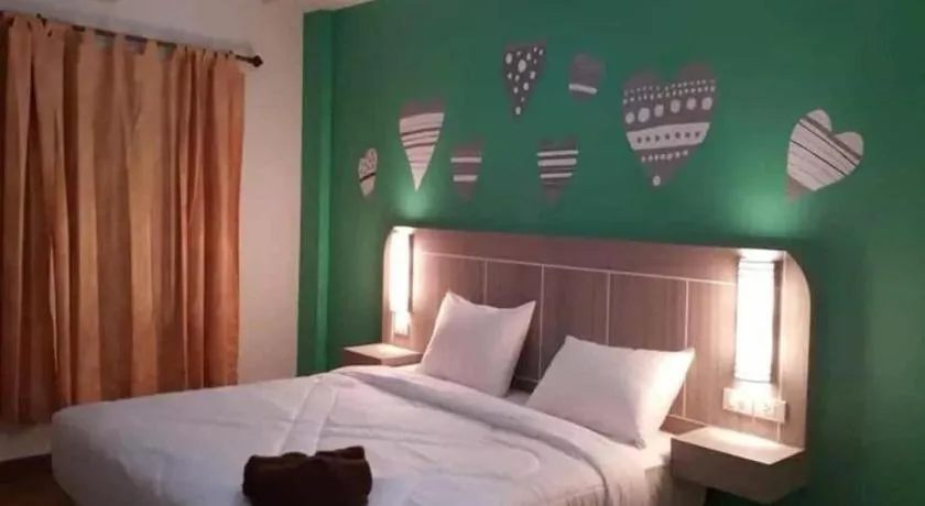 Bed in Silayok Grand Hotel