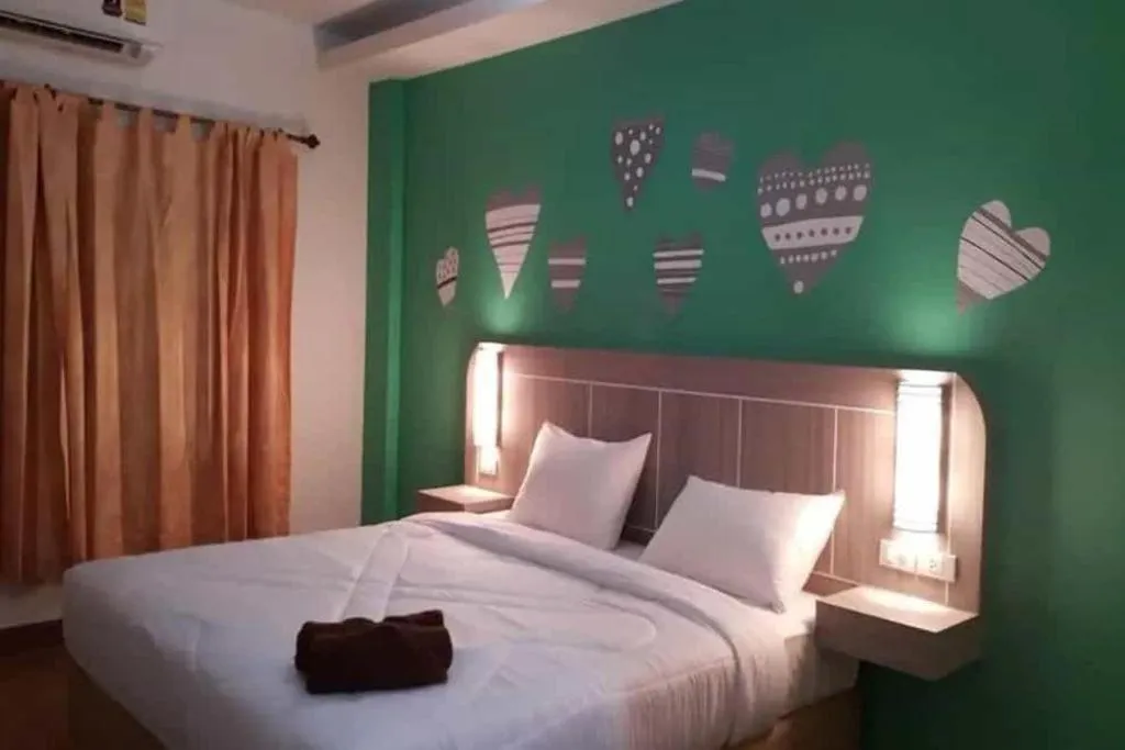 Bed in Silayok Grand Hotel