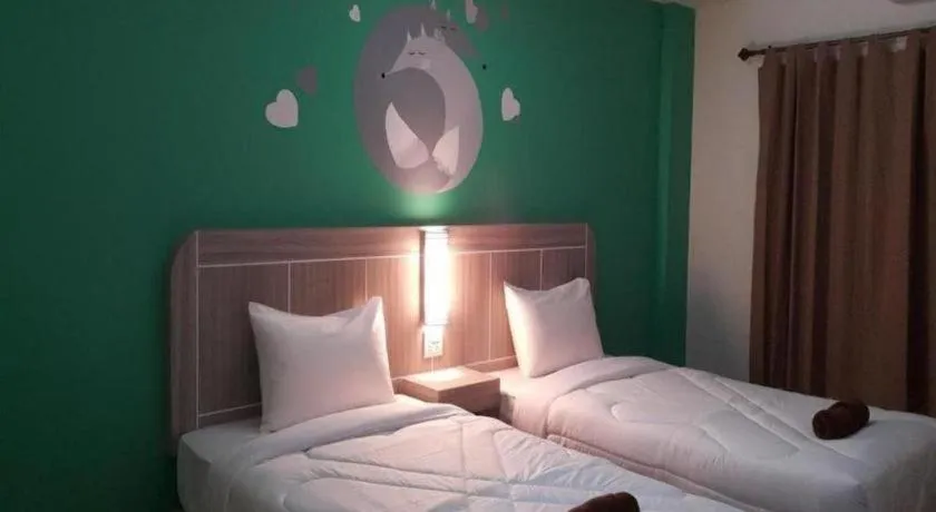 Bed in Silayok Grand Hotel