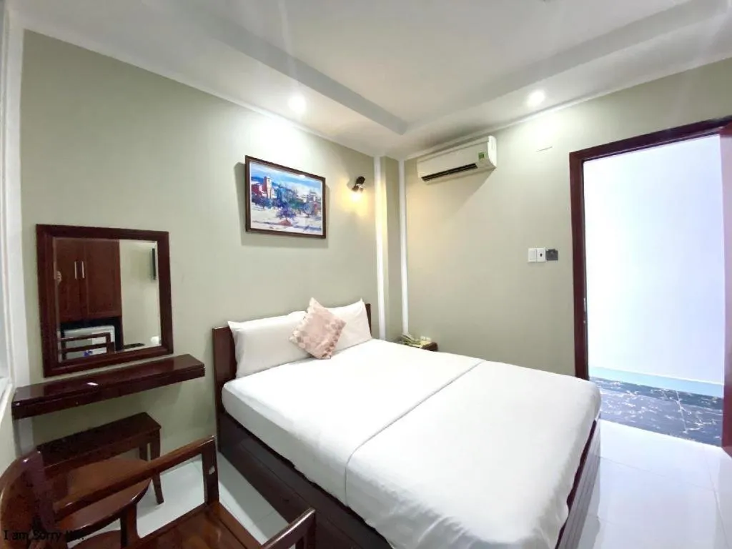 Bed in Mi Linh Hotel