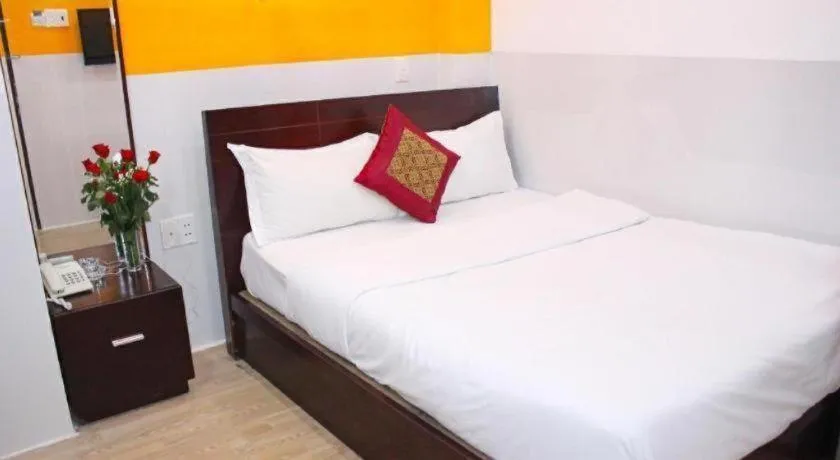 Bed in Mi Linh Hotel