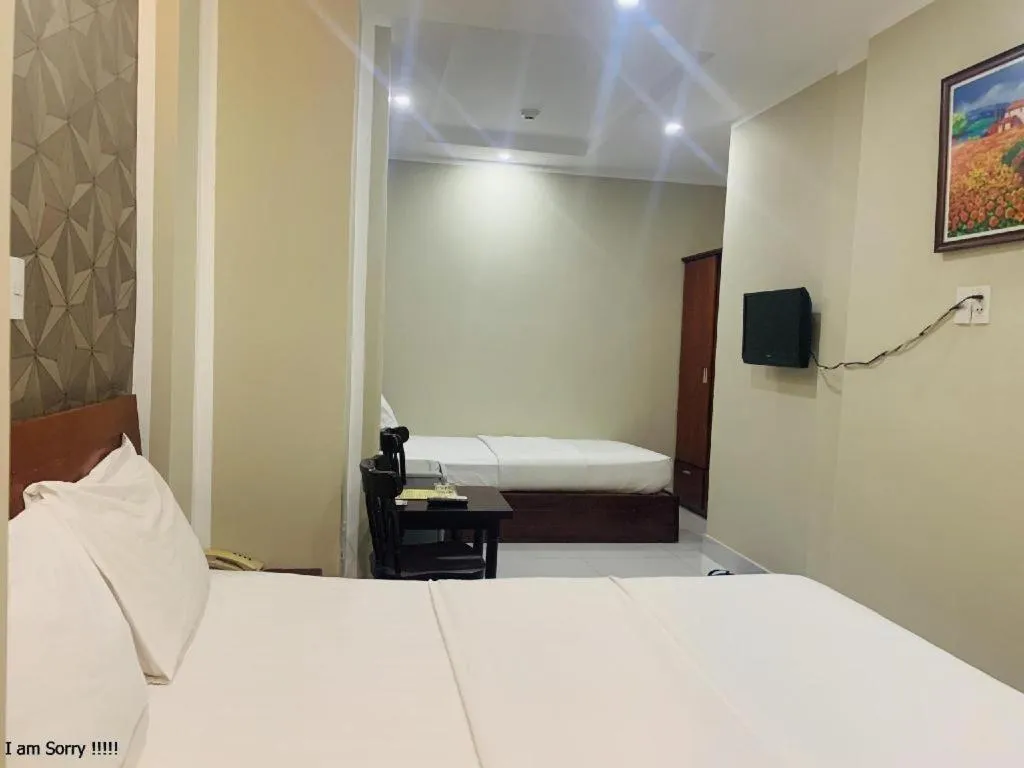 Bed in Mi Linh Hotel