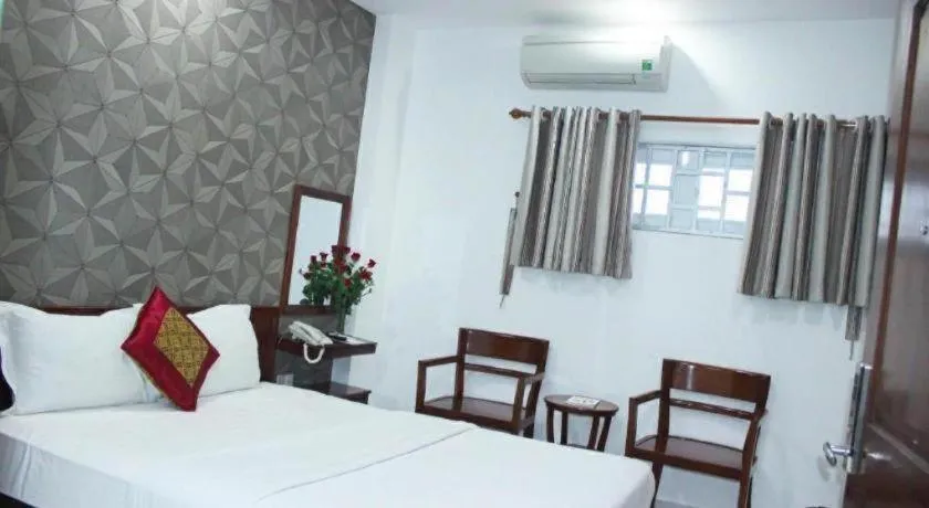 Bed in Mi Linh Hotel