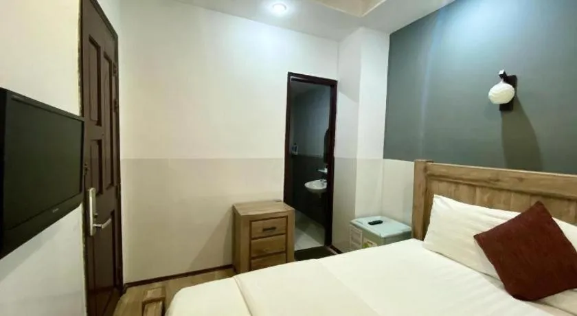 Bed in Mi Linh Hotel