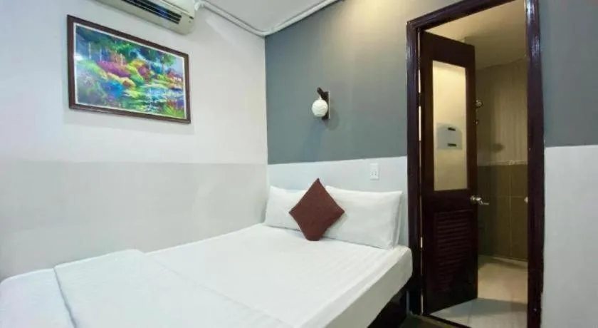 Bed in Mi Linh Hotel