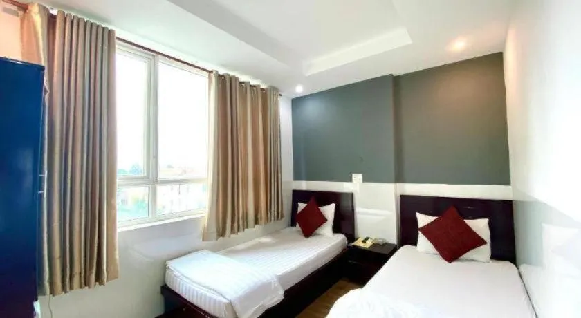 Bed in Mi Linh Hotel