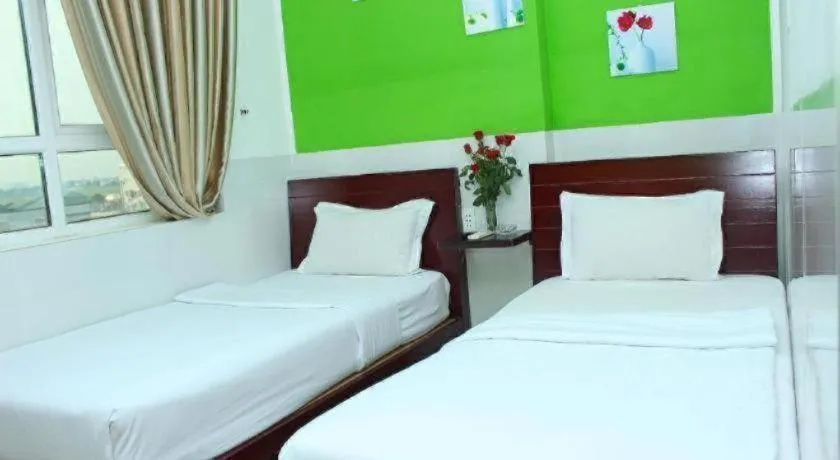 Bed in Mi Linh Hotel