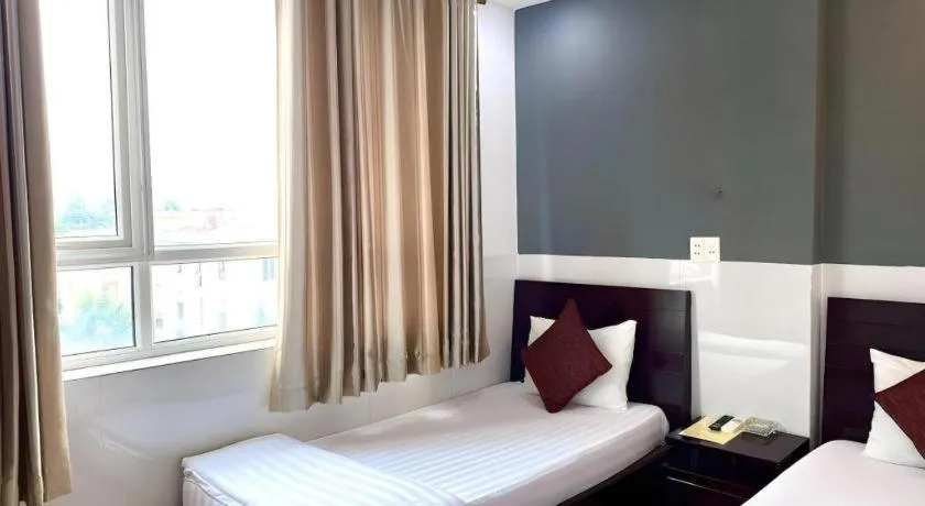 Bed in Mi Linh Hotel