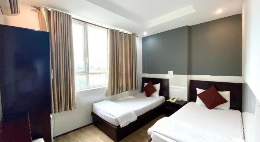 Bed in Mi Linh Hotel