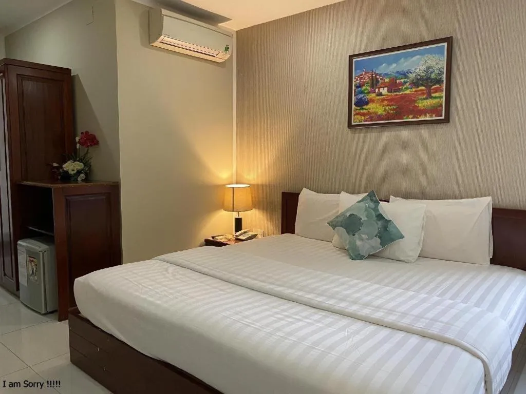 Bed in Mi Linh Hotel