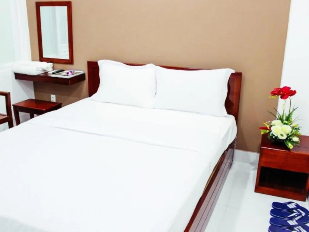 Bed in Mi Linh Hotel