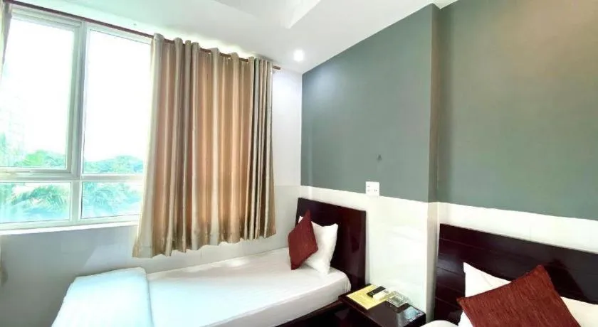 Bed in Mi Linh Hotel