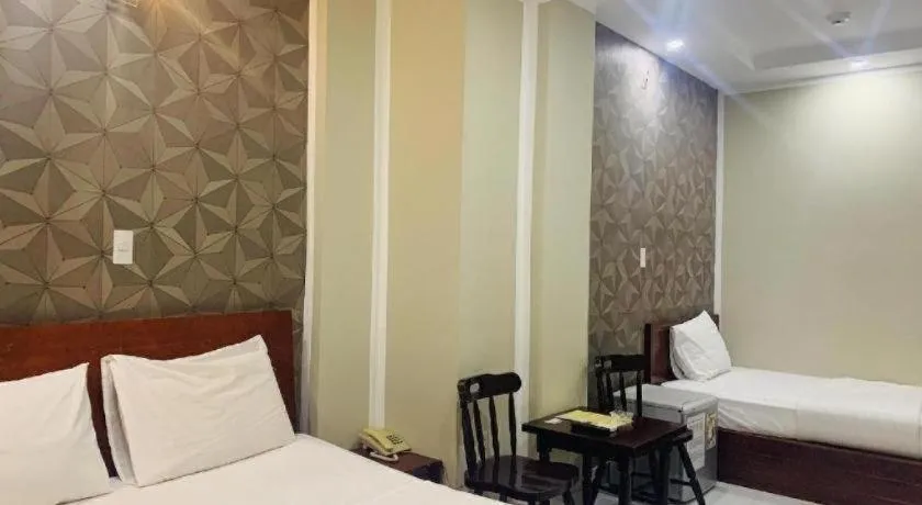 Bed in Mi Linh Hotel