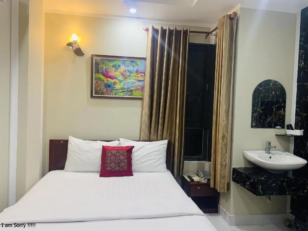 Bed in Mi Linh Hotel