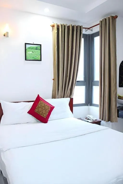 Bed in Mi Linh Hotel