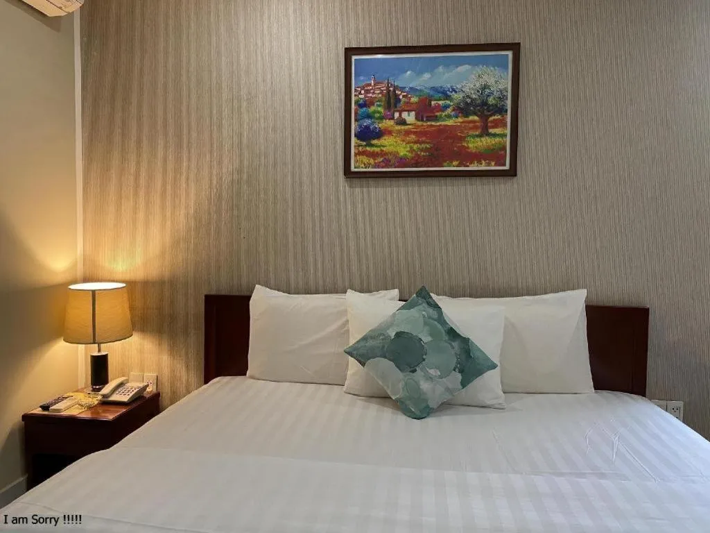 Bed in Mi Linh Hotel