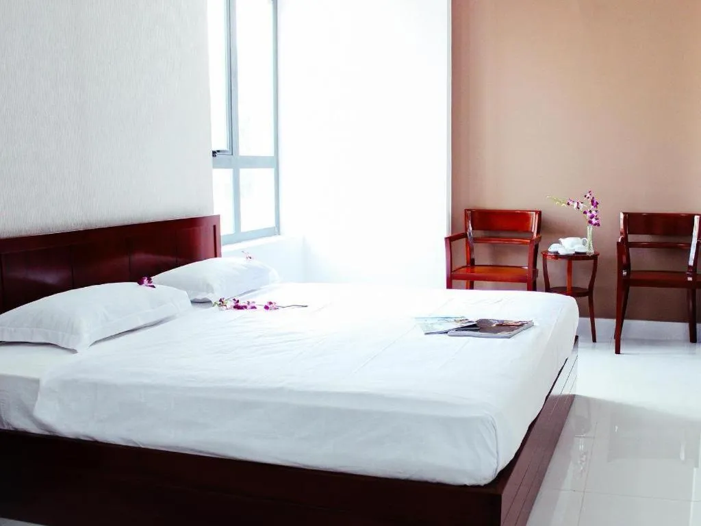 Bed in Mi Linh Hotel