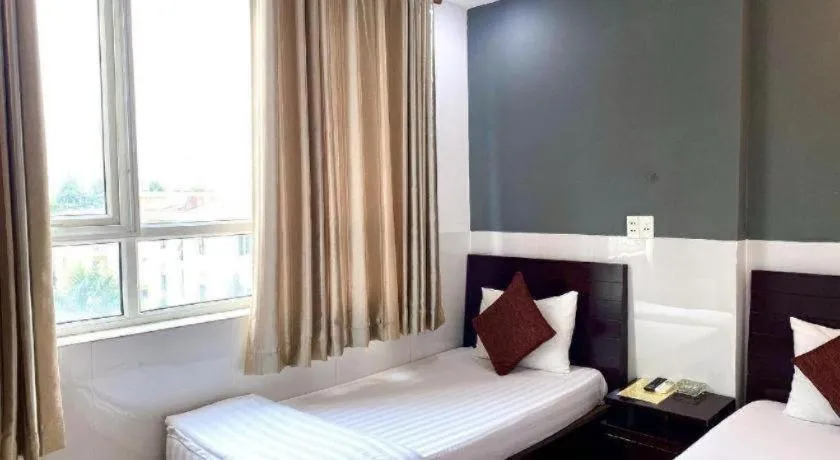 Bed in Mi Linh Hotel