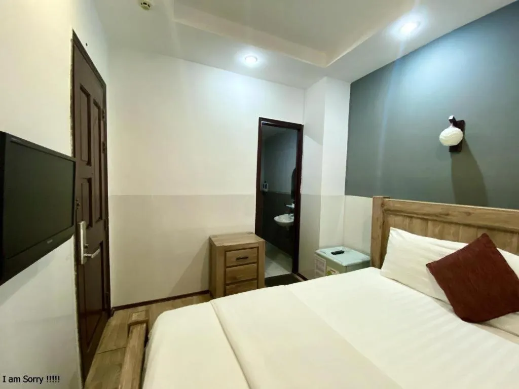 Bed in Mi Linh Hotel