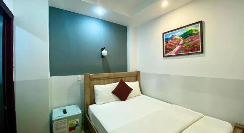 Bed in Mi Linh Hotel