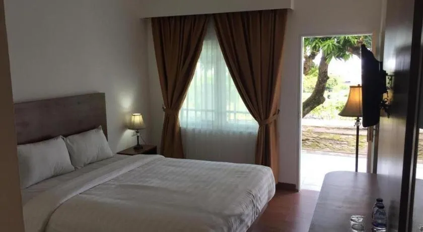 Bed in Satria Wisata Hotel