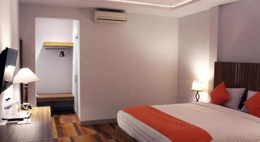 Bed in Satria Wisata Hotel