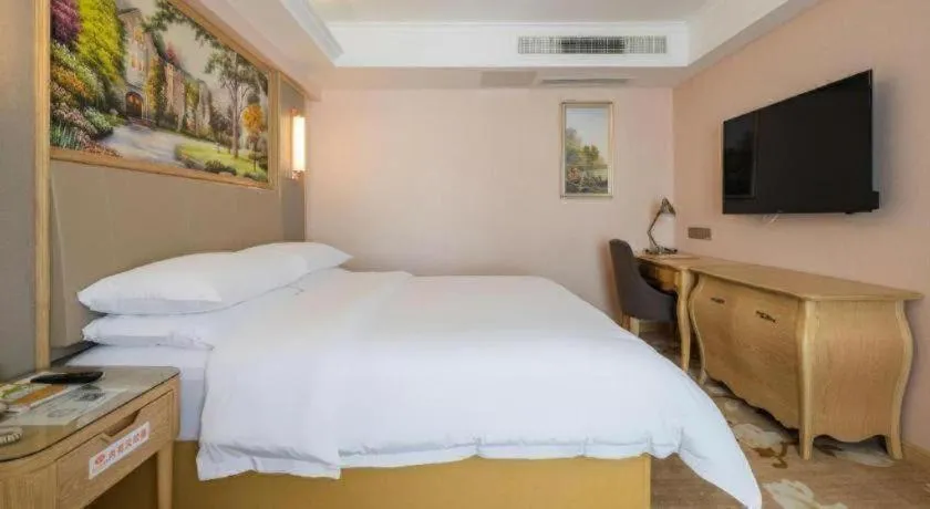 Bed in Vienna Hotel Yunnan Chunrong Street Qicai Yunan