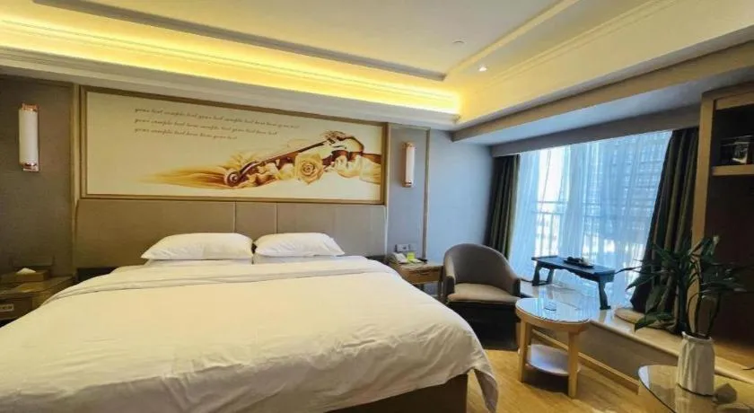 Bed in Vienna Hotel Yunnan Chunrong Street Qicai Yunan