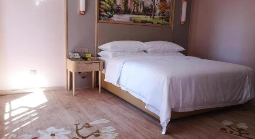 Bed in Vienna Hotel Yunnan Chunrong Street Qicai Yunan