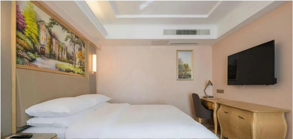 Bed in Vienna Hotel Yunnan Chunrong Street Qicai Yunan