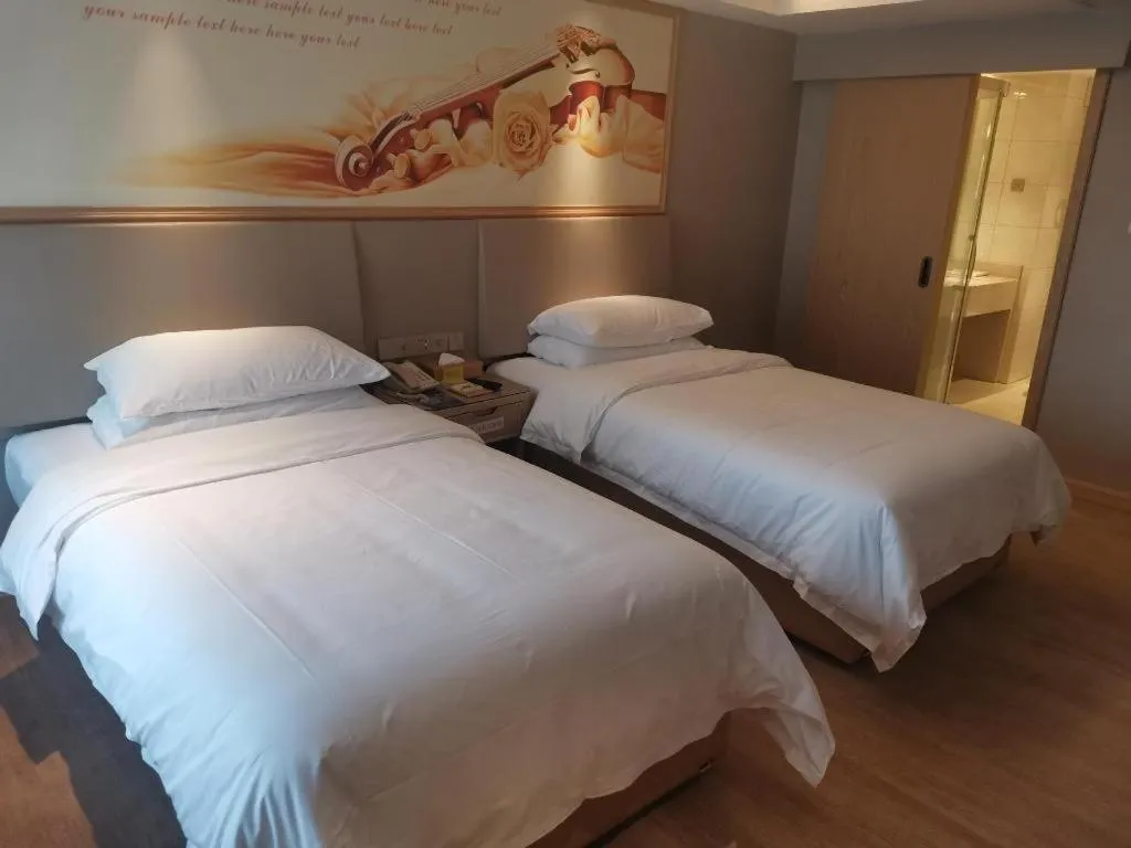 Bed in Vienna Hotel Yunnan Chunrong Street Qicai Yunan