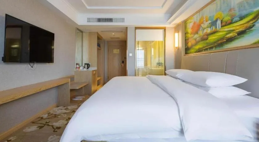 Bed in Vienna Hotel Yunnan Chunrong Street Qicai Yunan