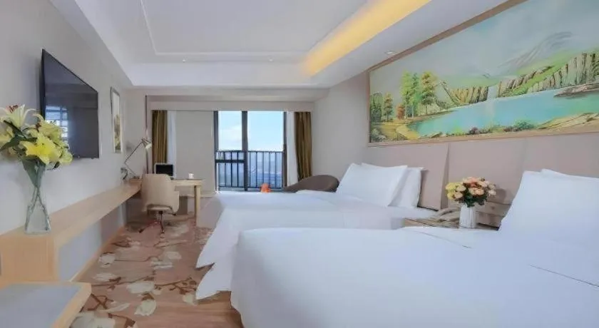 Bed in Vienna Hotel Yunnan Chunrong Street Qicai Yunan