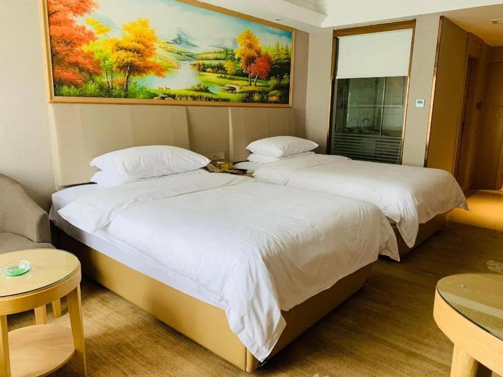 Bed in Vienna Hotel Yunnan Chunrong Street Qicai Yunan