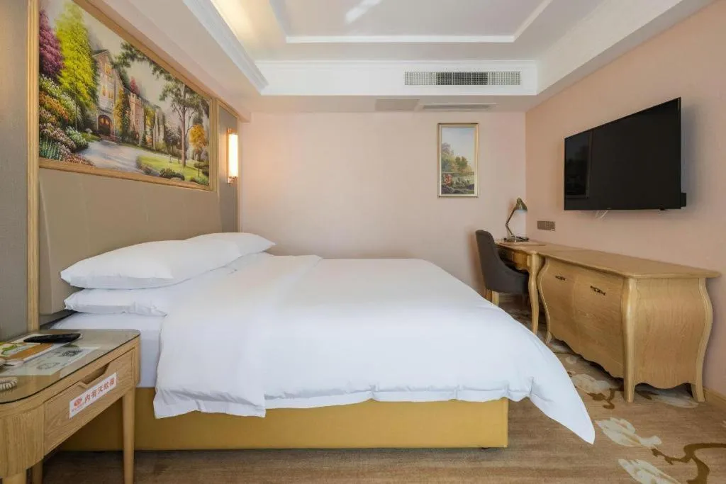 Bed in Vienna Hotel Yunnan Chunrong Street Qicai Yunan