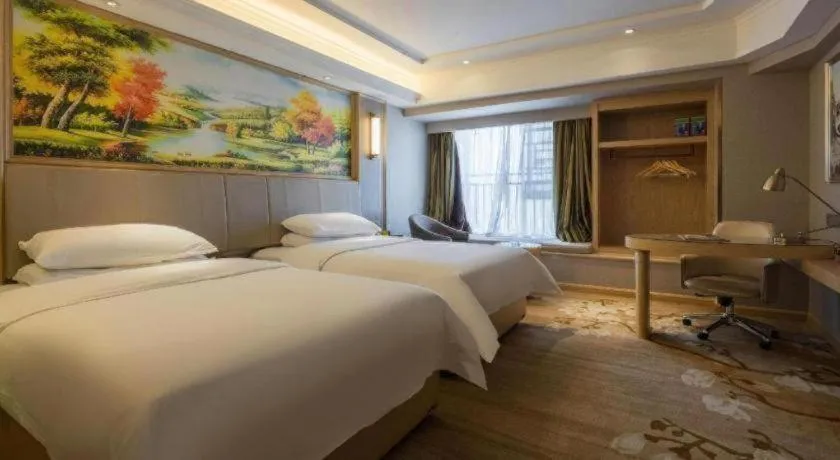 Bed in Vienna Hotel Yunnan Chunrong Street Qicai Yunan